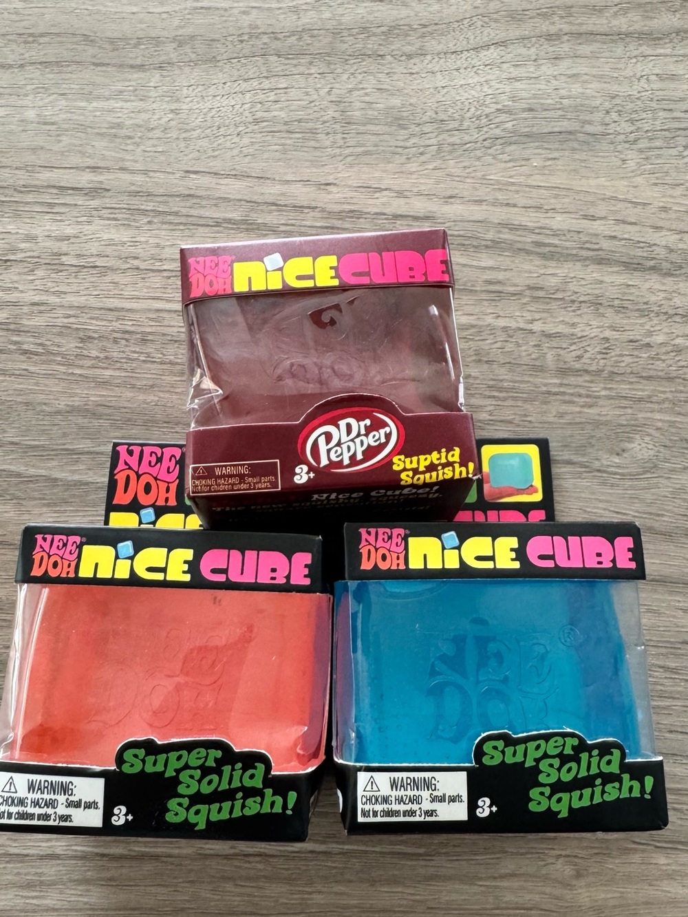 NeeDoh Nice Cube Super Solid Squish - Red, Blue, Pink (Dr Pepper Edition)